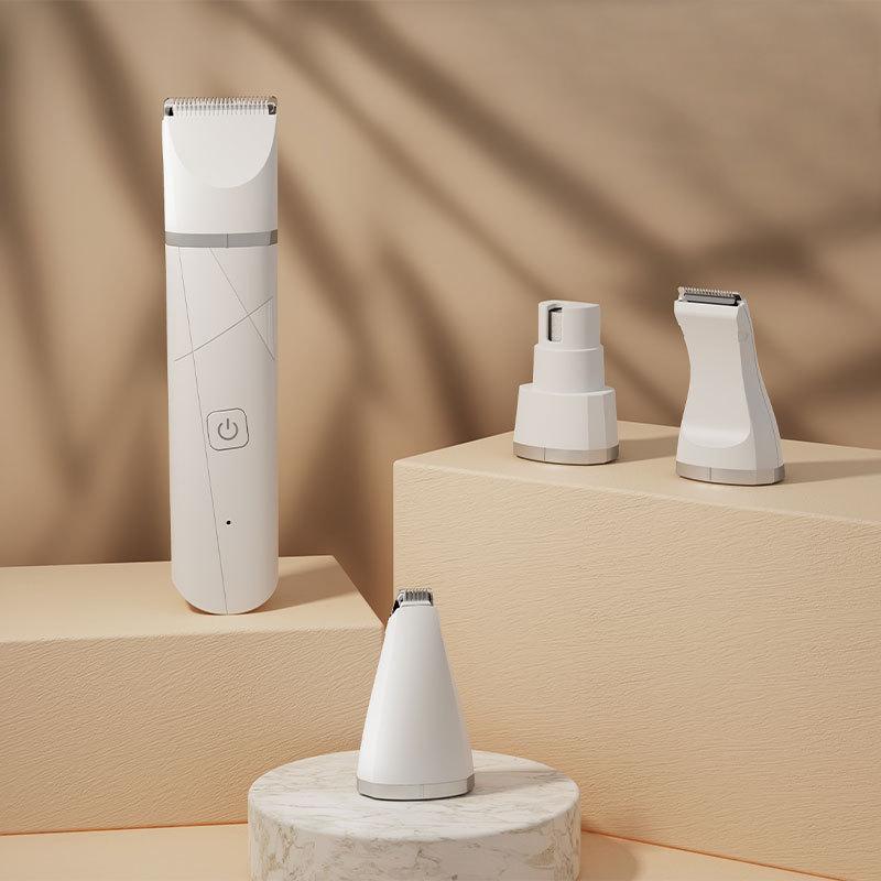 White waterproof pet hair trimmer with 4 interchangeable blade heads and USB charging