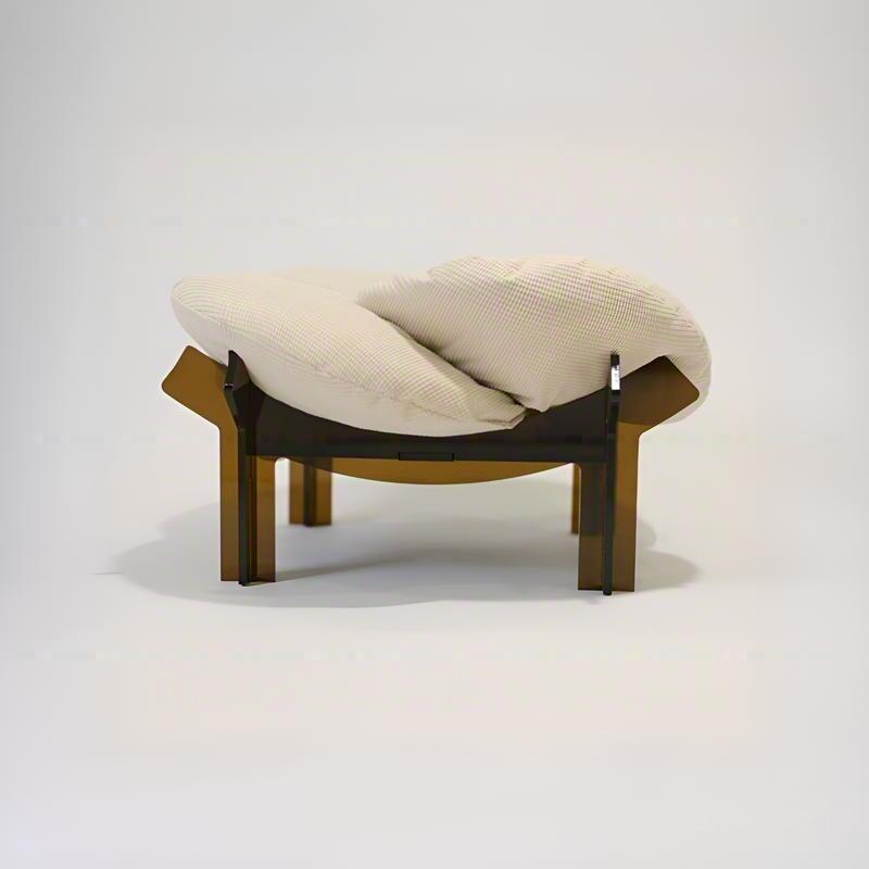 Clear acrylic pet lounge bed with modern minimalist design and soft cushion