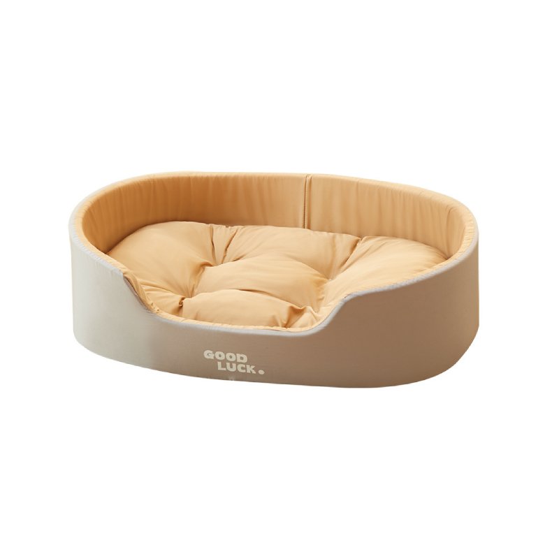 Brown plush oval pet bed with raised edges and soft cushion for cats and dogs