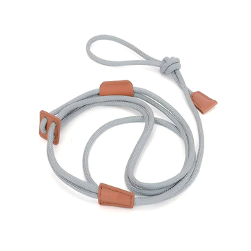 Gray cable-style dog harness with strong metal hardware