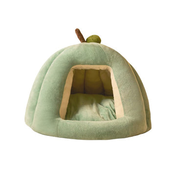 Green pumpkin-shaped pet cave bed with warm plush interior for cats and small dogs